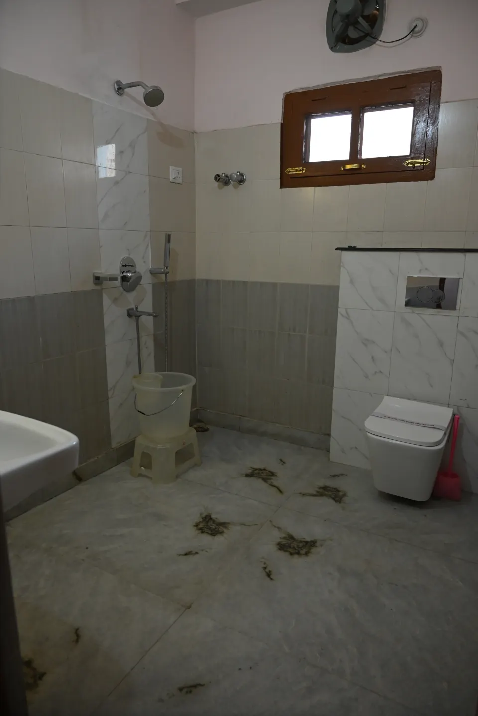 Attached bathroom with shower and hot and cold water