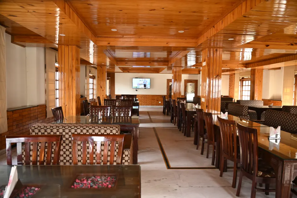 Spacious restaurant dining hall at Hotel Atul Regency